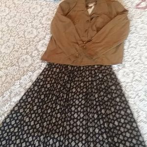 This is a dress with a jacket attached